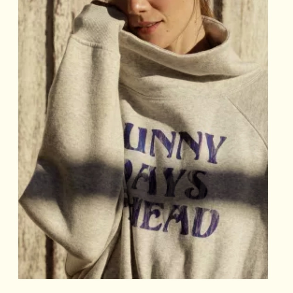 Anthropologie graphic sweatshirt in gray.